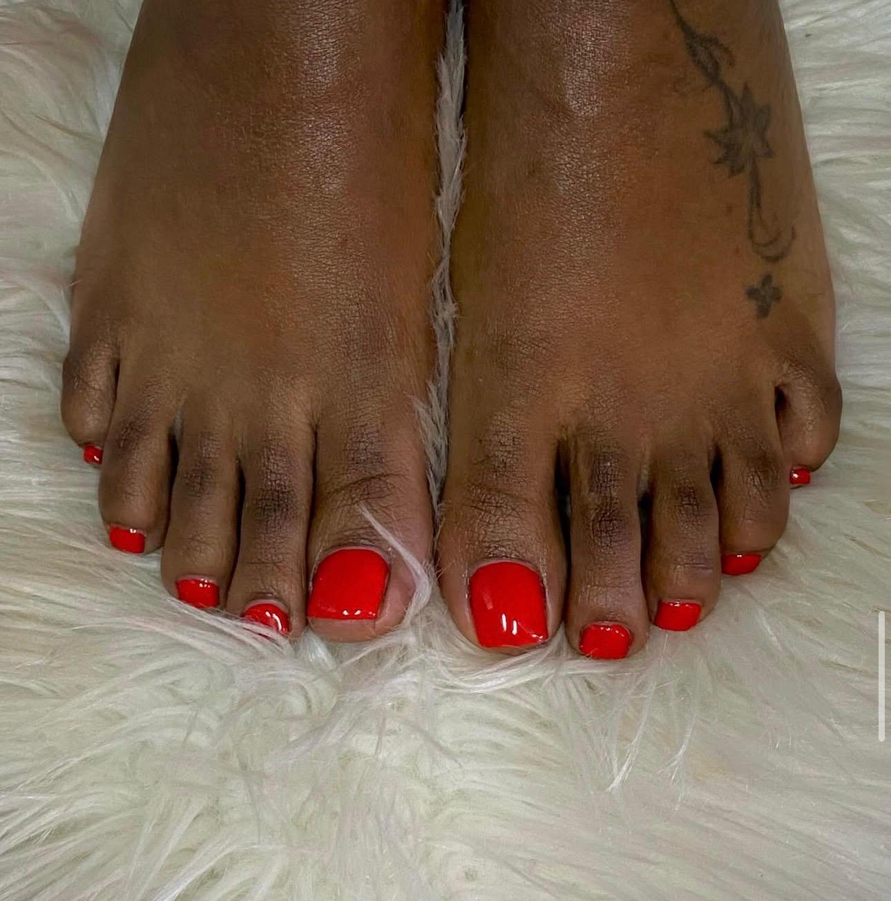 Red gel pedicure toes