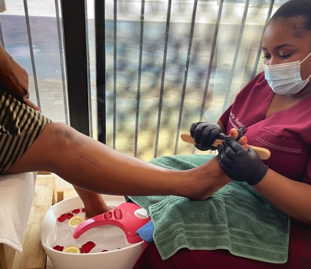 Therapist working on a client's nails