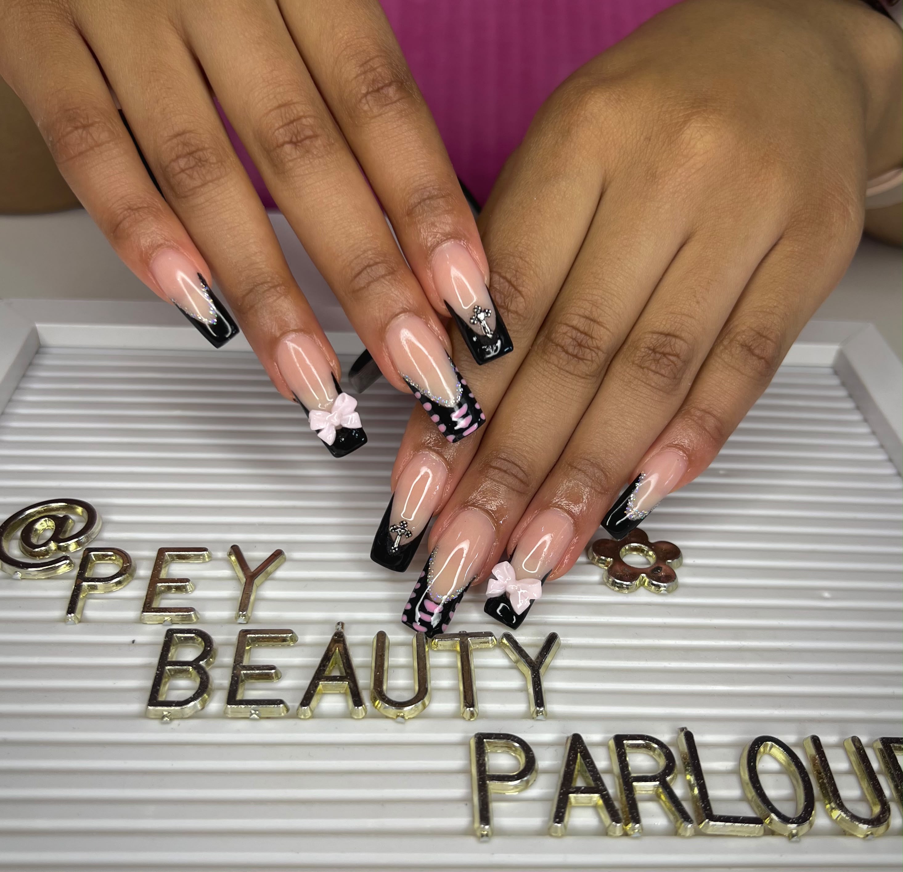 Long nails with black and white floral nail art